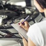 high-angle-woman-feeling-car-service-form